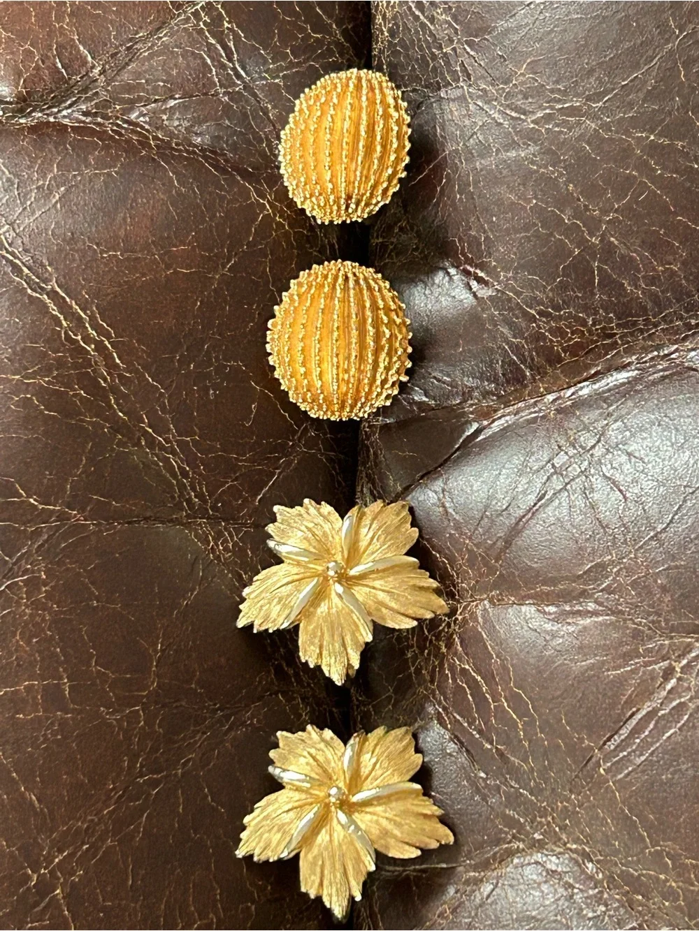 2 pairs of #CrownTrifari Clip-on Earrings. Gold-Tone Ribbed Domes and Florals.